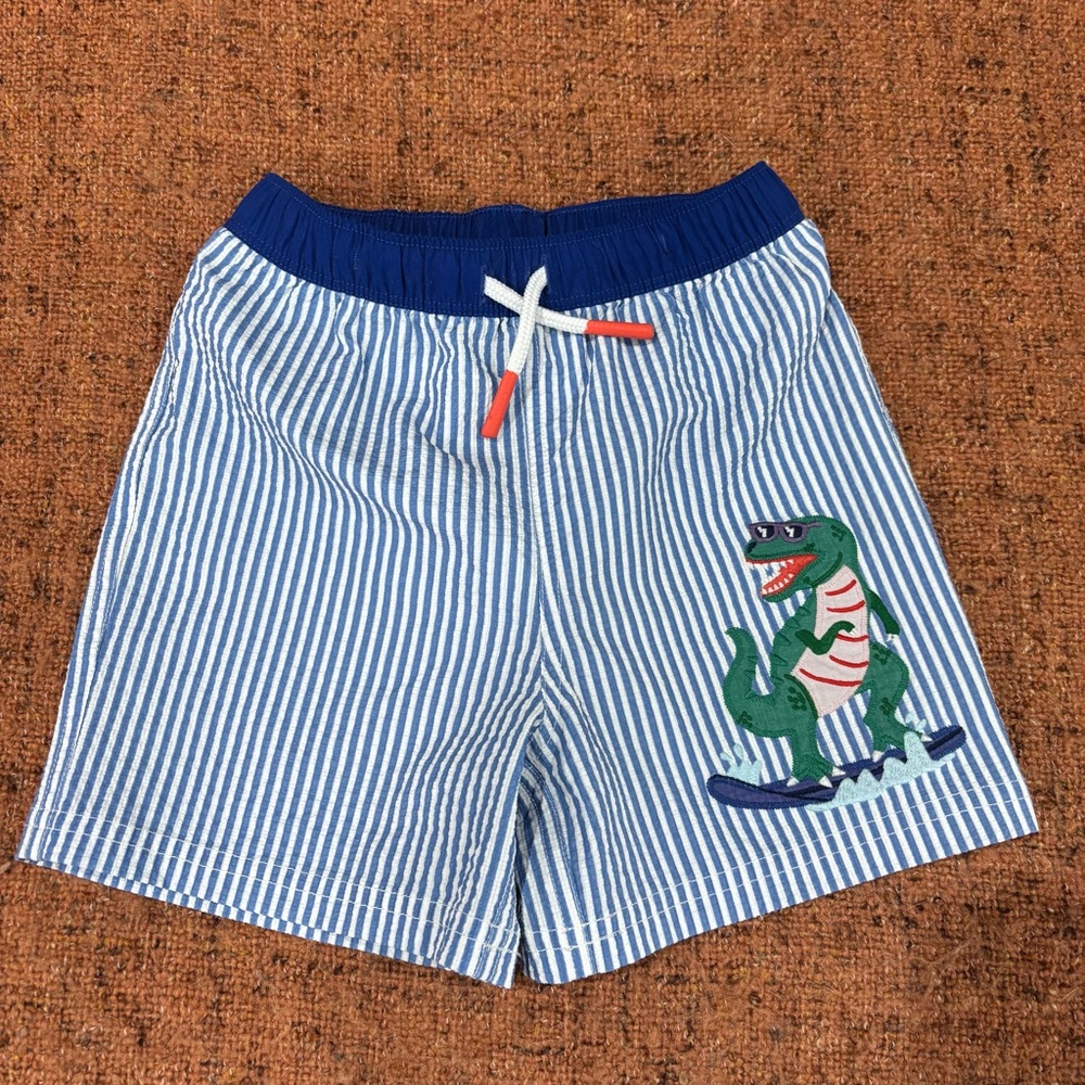 Mini Boden boys 4-5yrs Blue Striped Swim Trunks w/embroidered Dinosaur